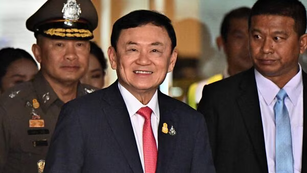 FILES-THAILAND-POLITICS-THAKSIN-1_1708148857352_1708148877097